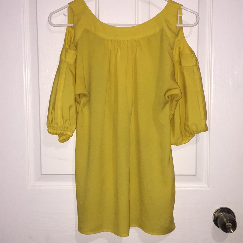 Bright yellow blouse